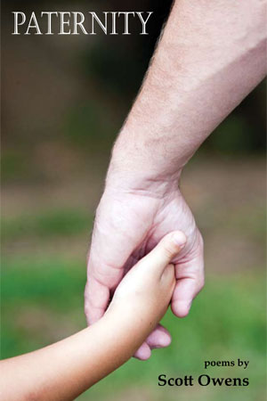 Father and child holding hands